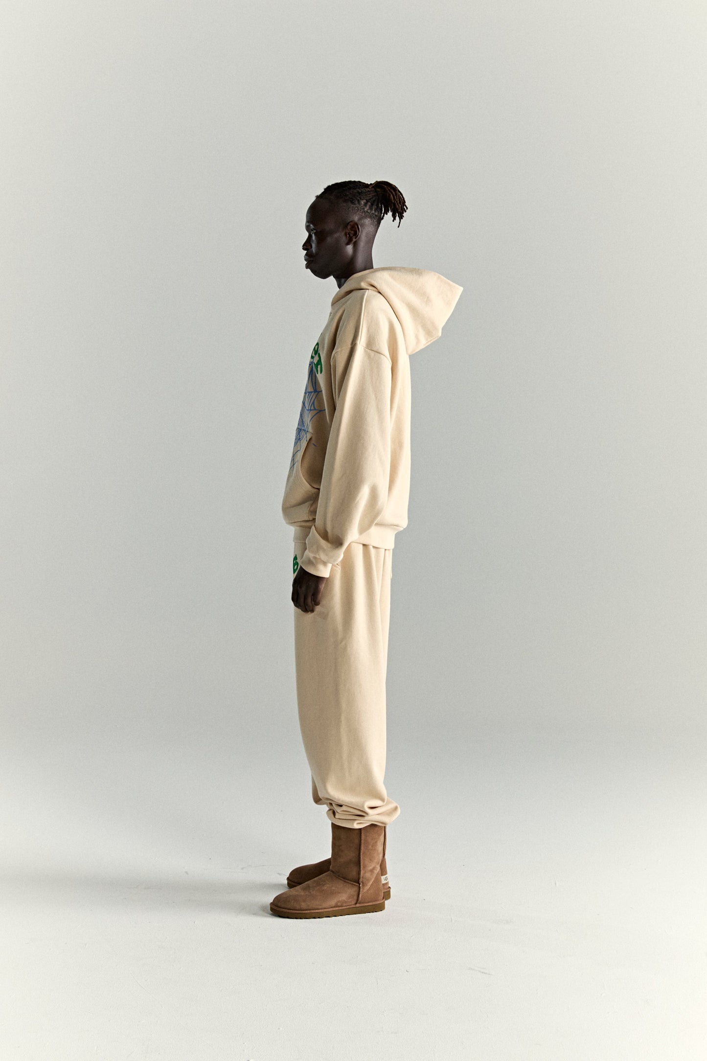 CREAM OG WEB V2 HOODIE ON MODEL