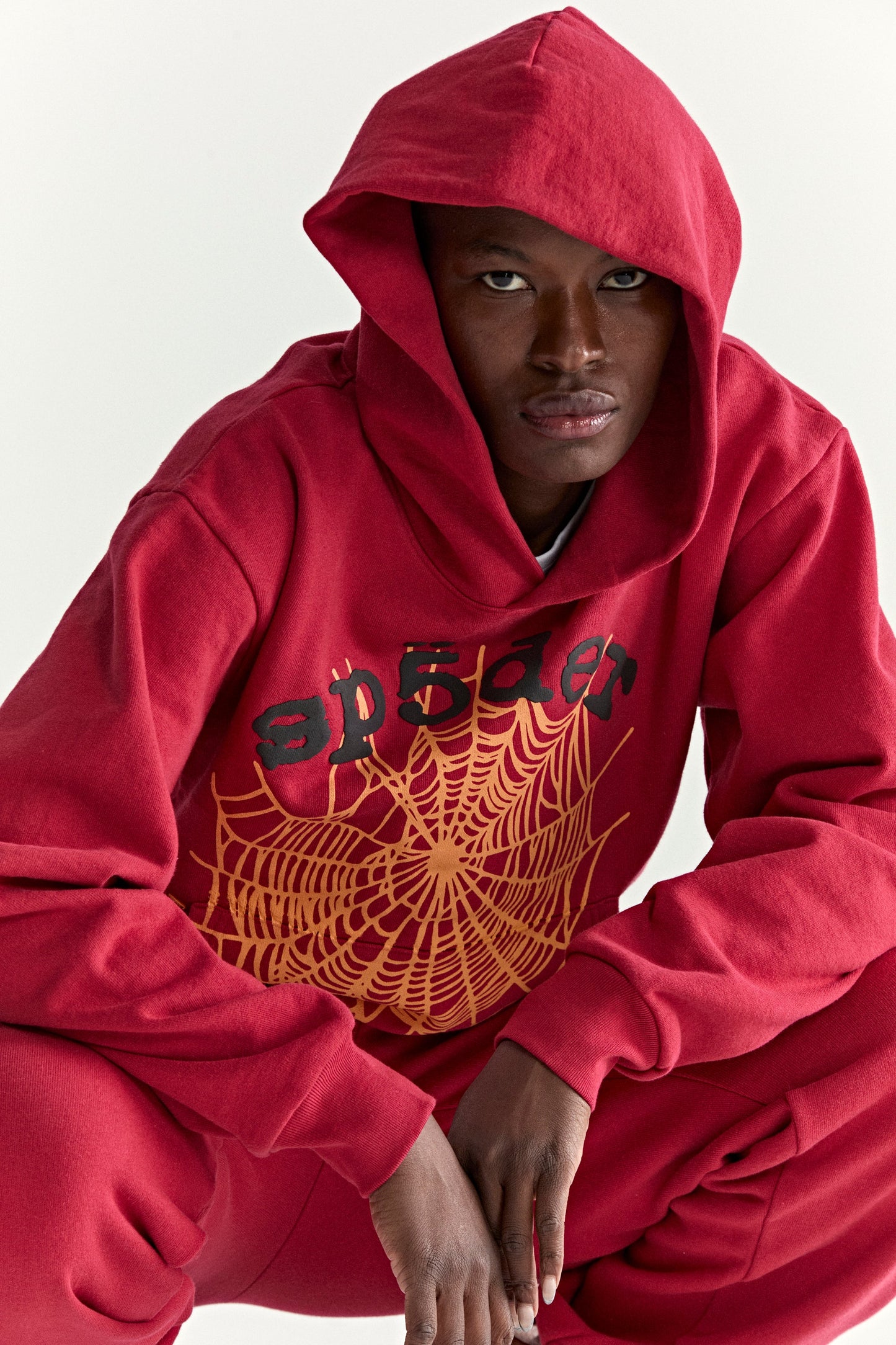 RED OG WEB V2 HOODIE ON MODEL