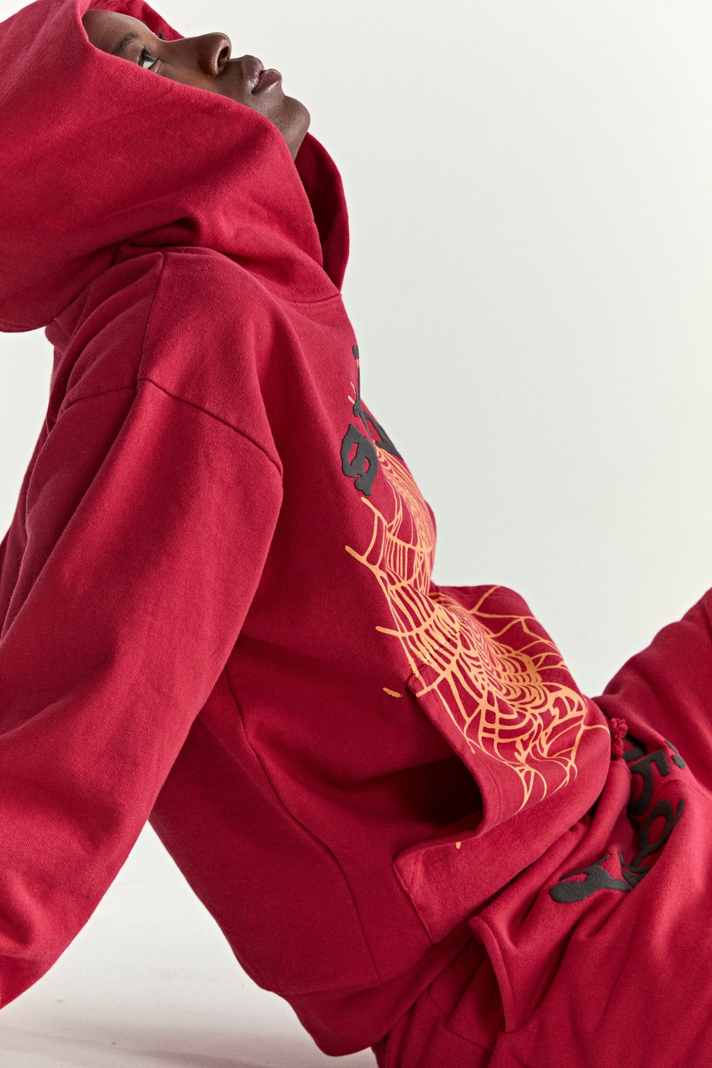 RED OG WEB V2 HOODIE ON MODEL
