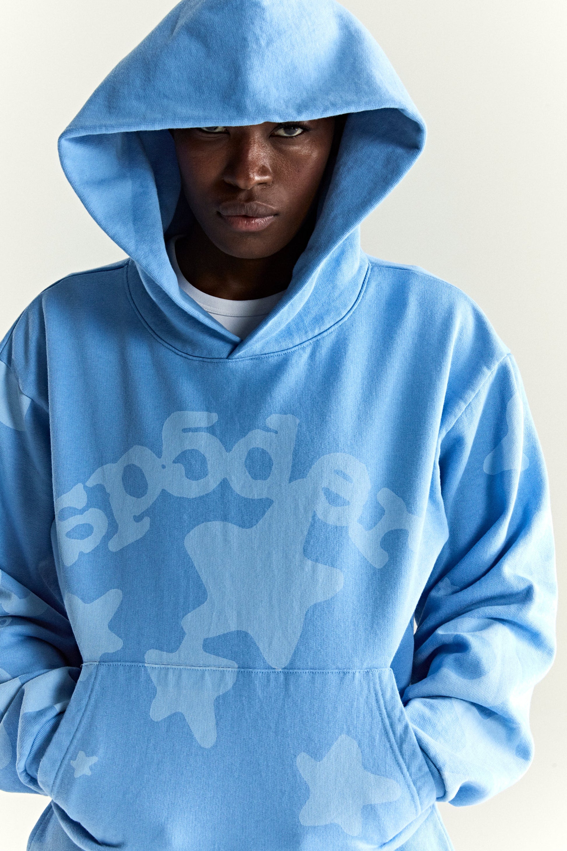 DUSTY BLUE BELUGA V2 HOODIE ON MODEL