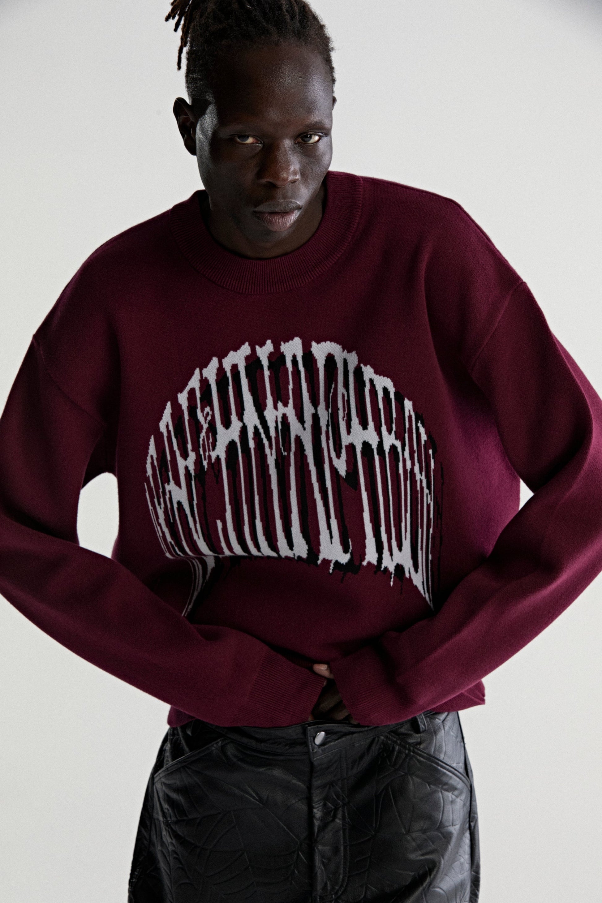 BURGUNDY ARACHNAPHOBIA SWEATER ON MODEL