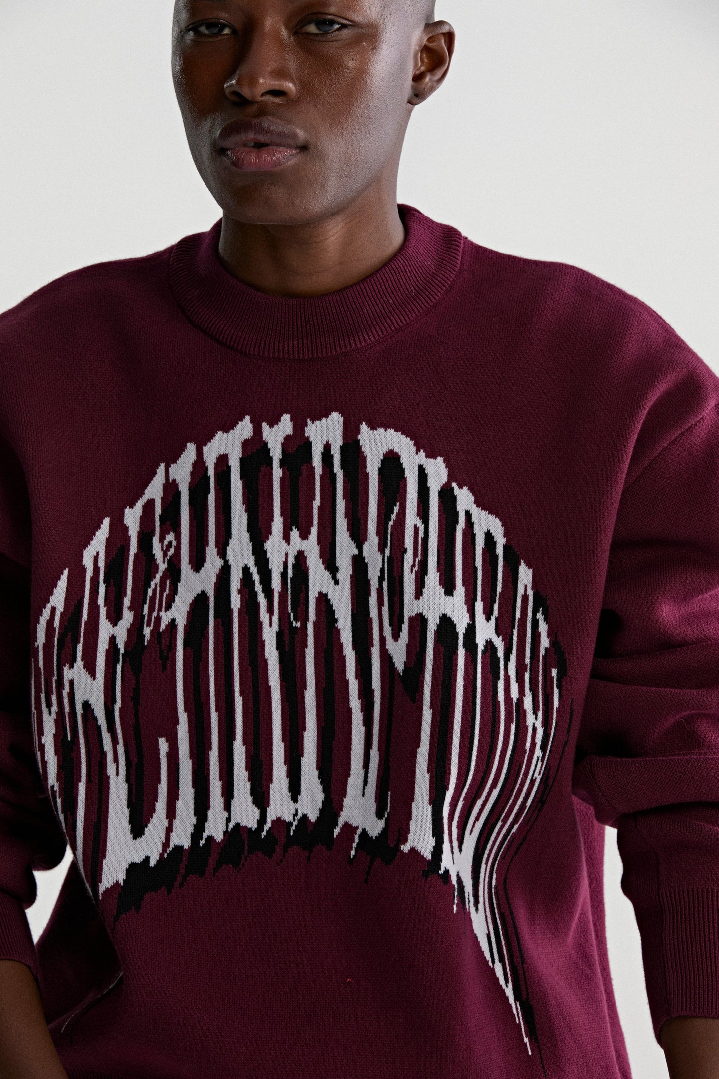 BURGUNDY ARACHNAPHOBIA SWEATER ON MODEL