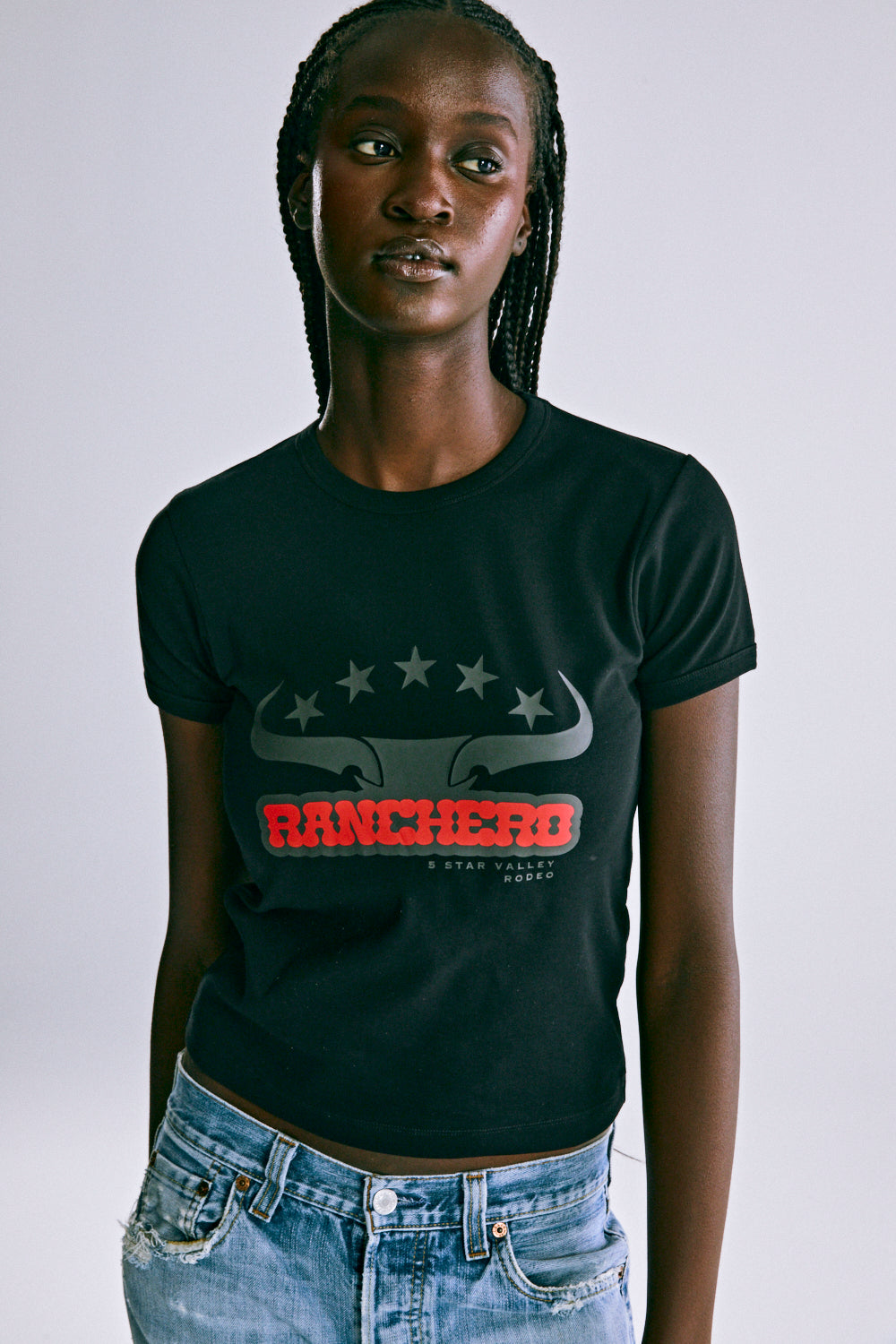 BLACK RANCHERO BABY TEE ON MODEL