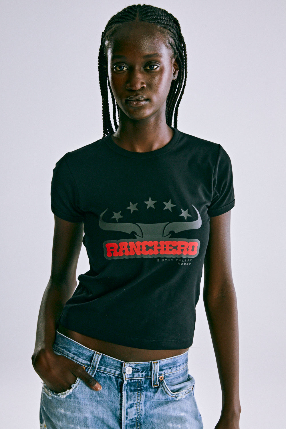 BLACK RANCHERO BABY TEE ON MODEL