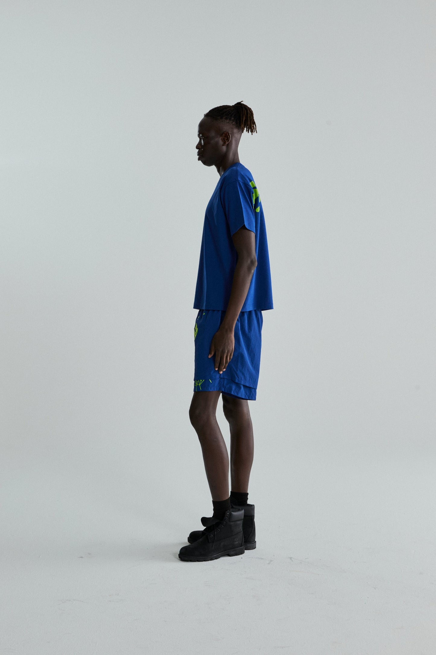 BLUE TM TEE ON MODEL