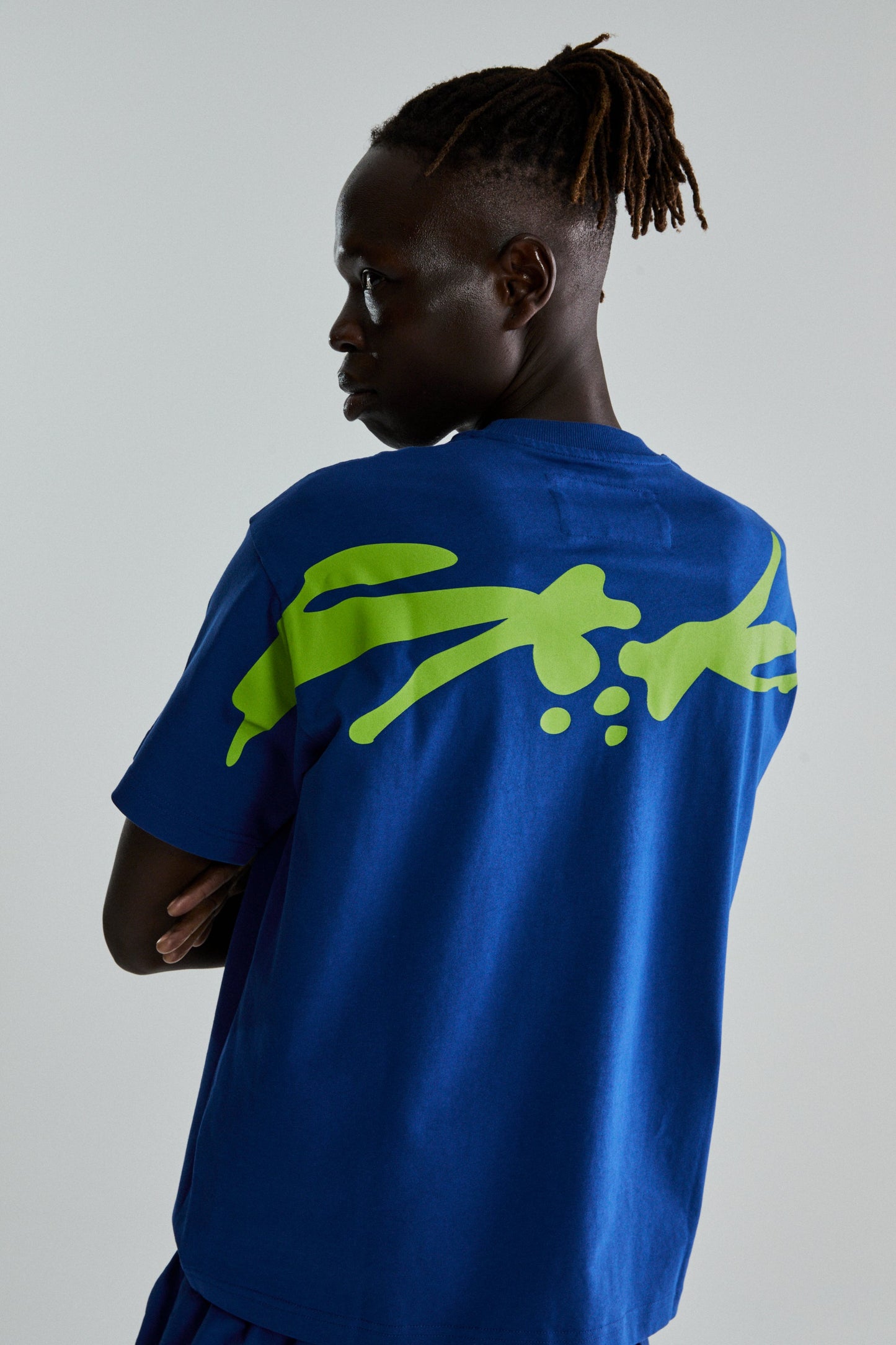 BLUE TM TEE ON MODEL