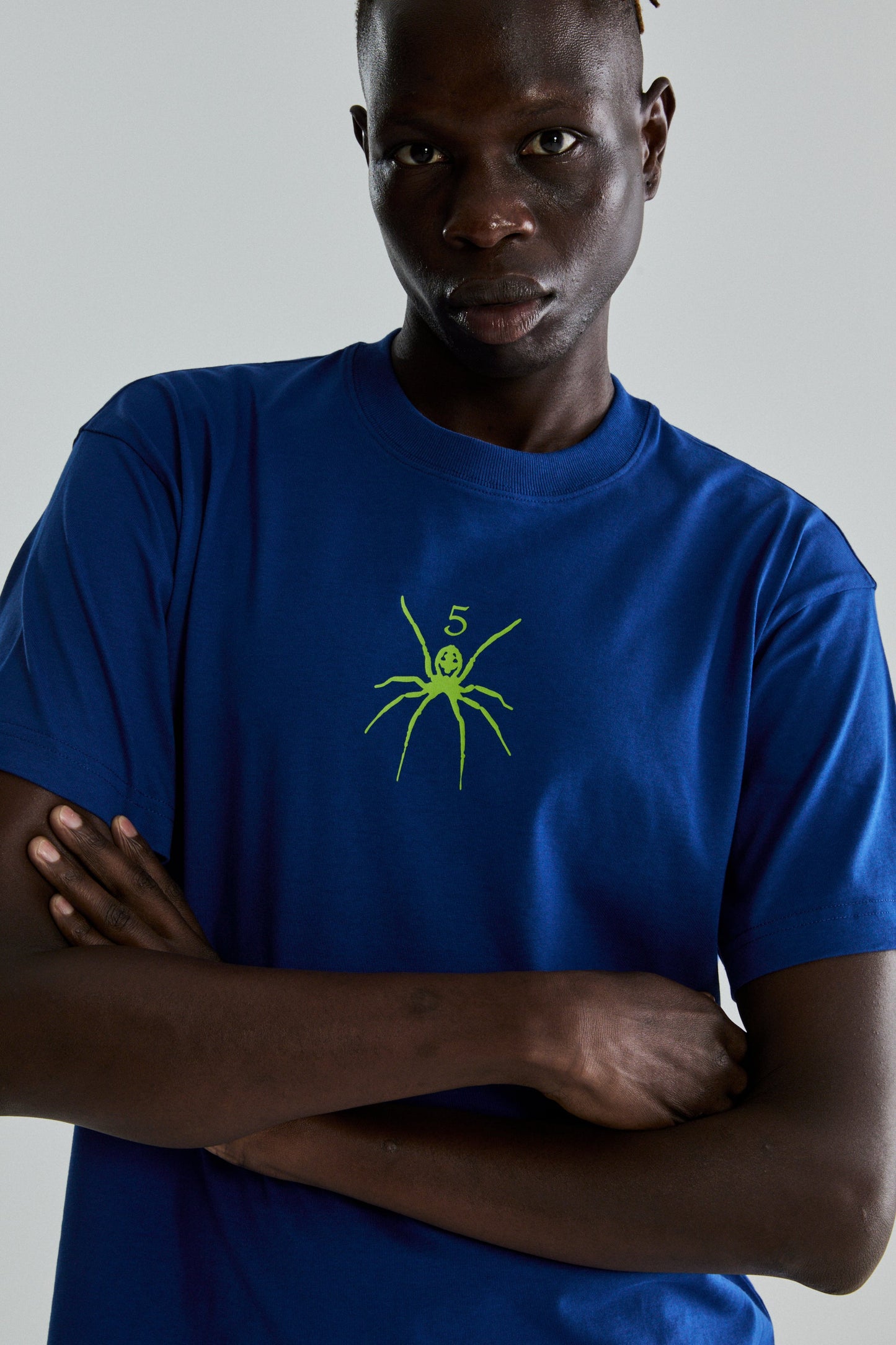 BLUE TM TEE ON MODEL
