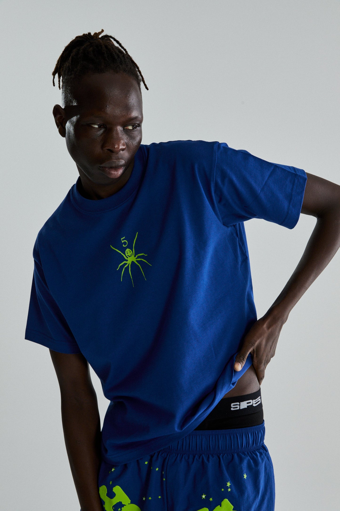 BLUE TM TEE ON MODEL