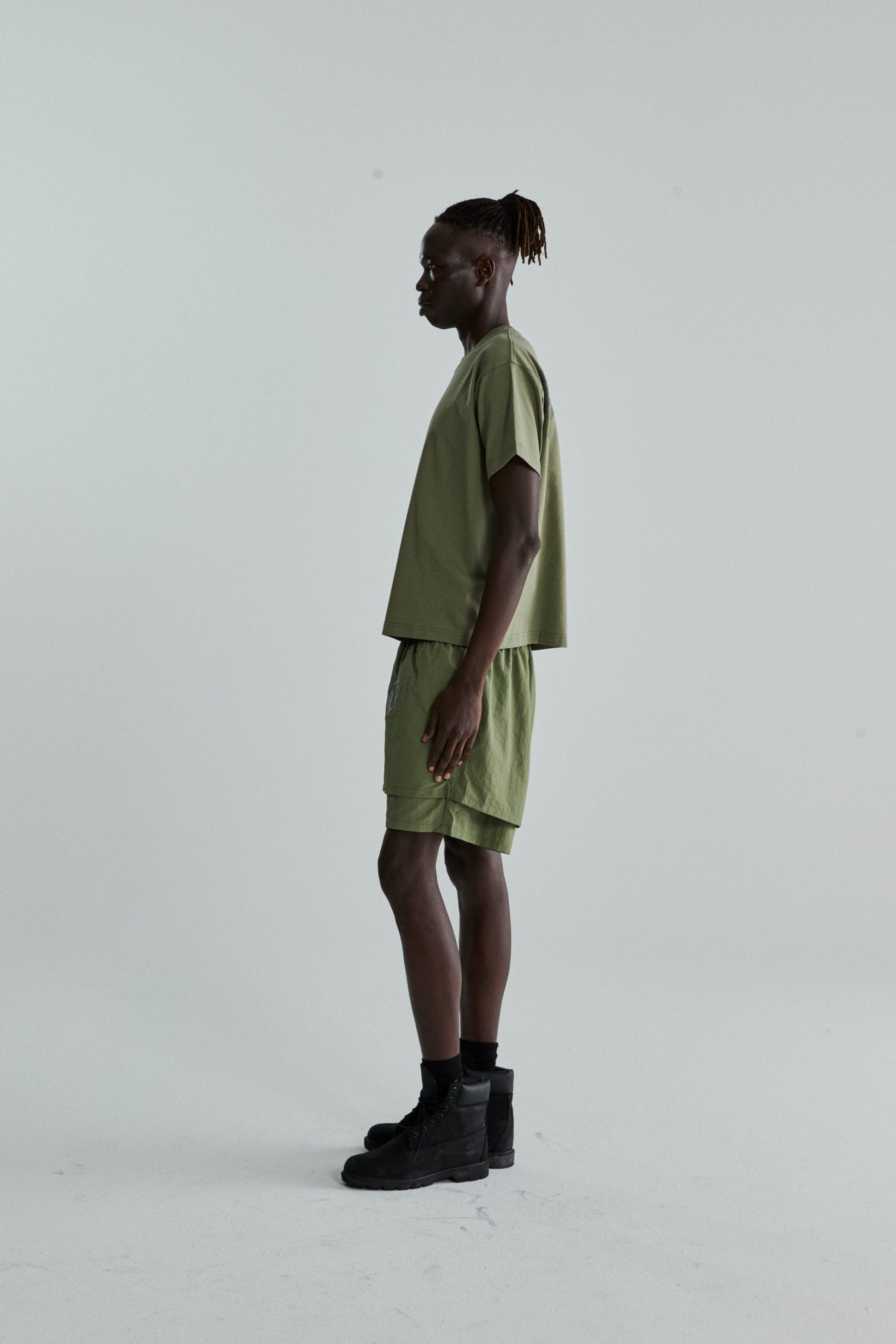 SAGE GREEN TM TEE ON MODEL