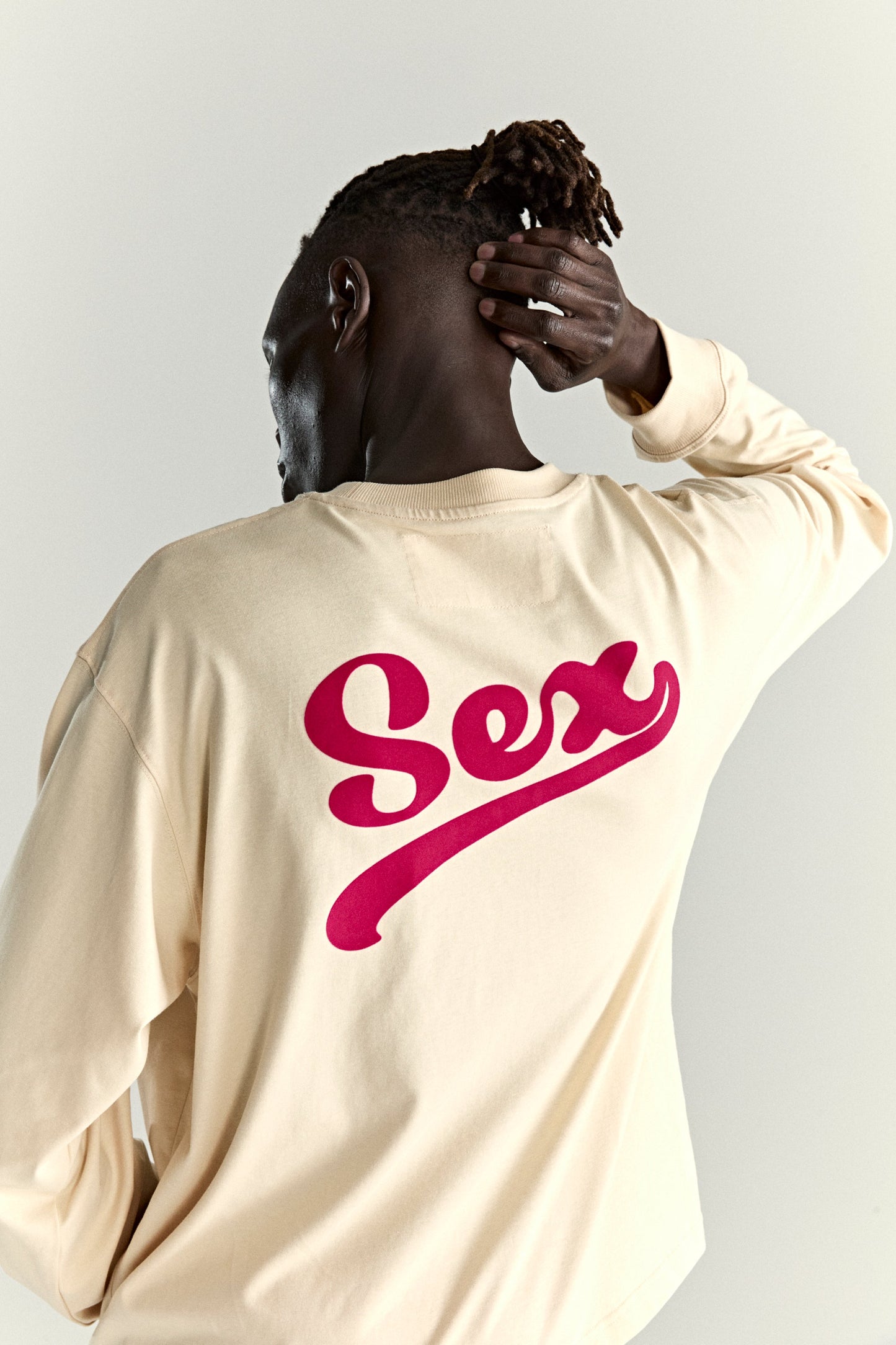 CREAM PORNSTAR LONGSLEEVE TEE ON MODEL