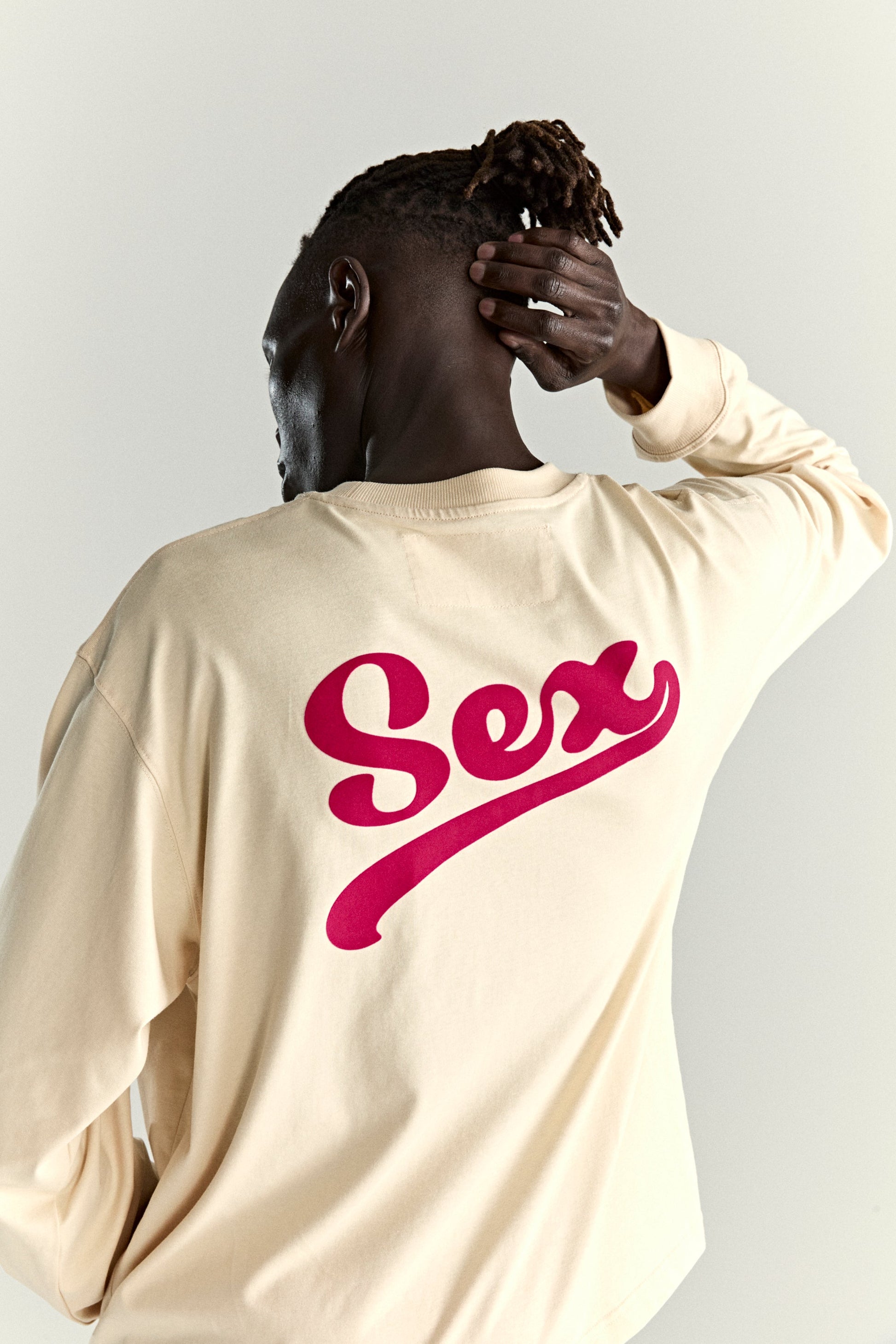 CREAM PORNSTAR LONGSLEEVE TEE ON MODEL