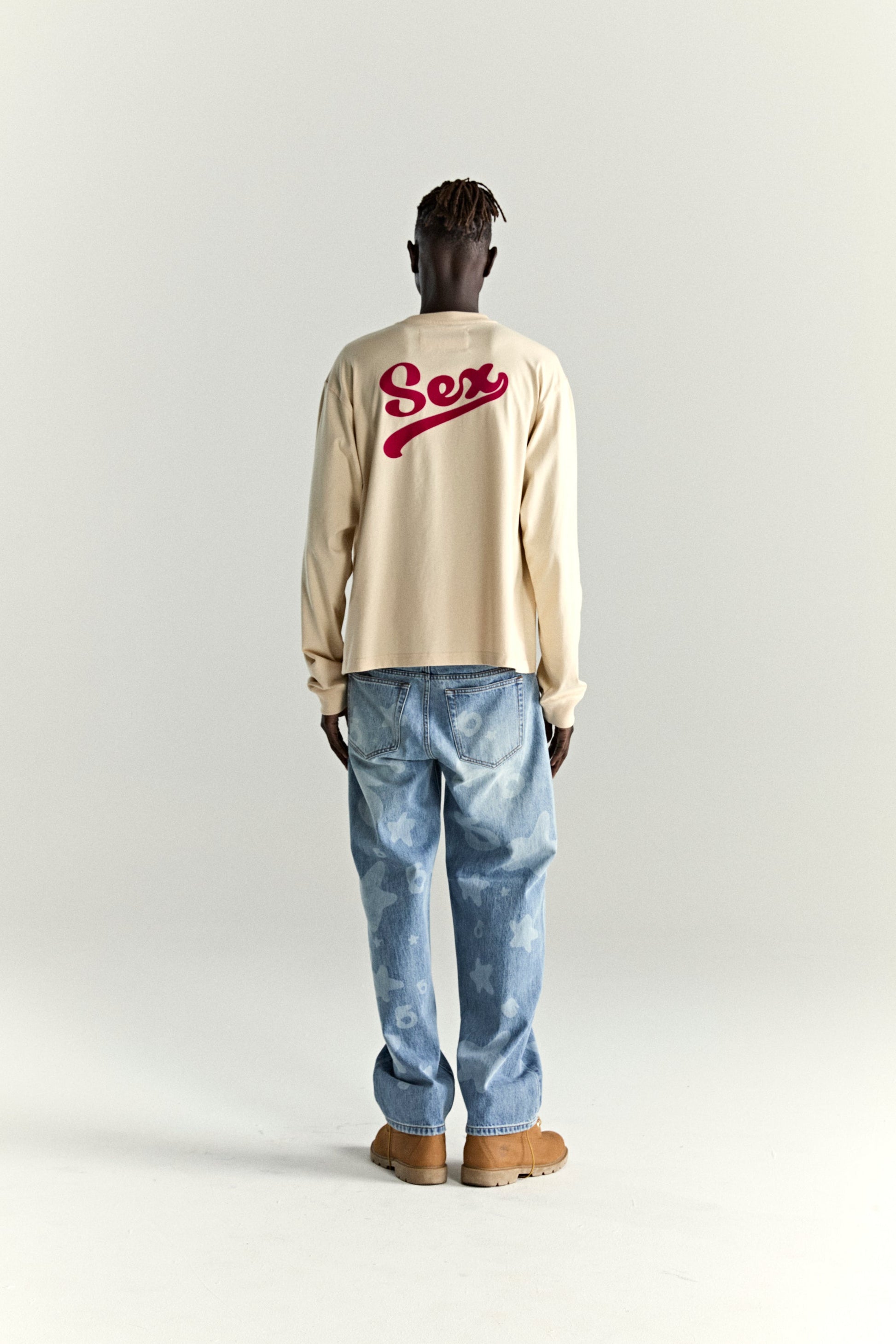CREAM PORNSTAR LONGSLEEVE TEE ON MODEL