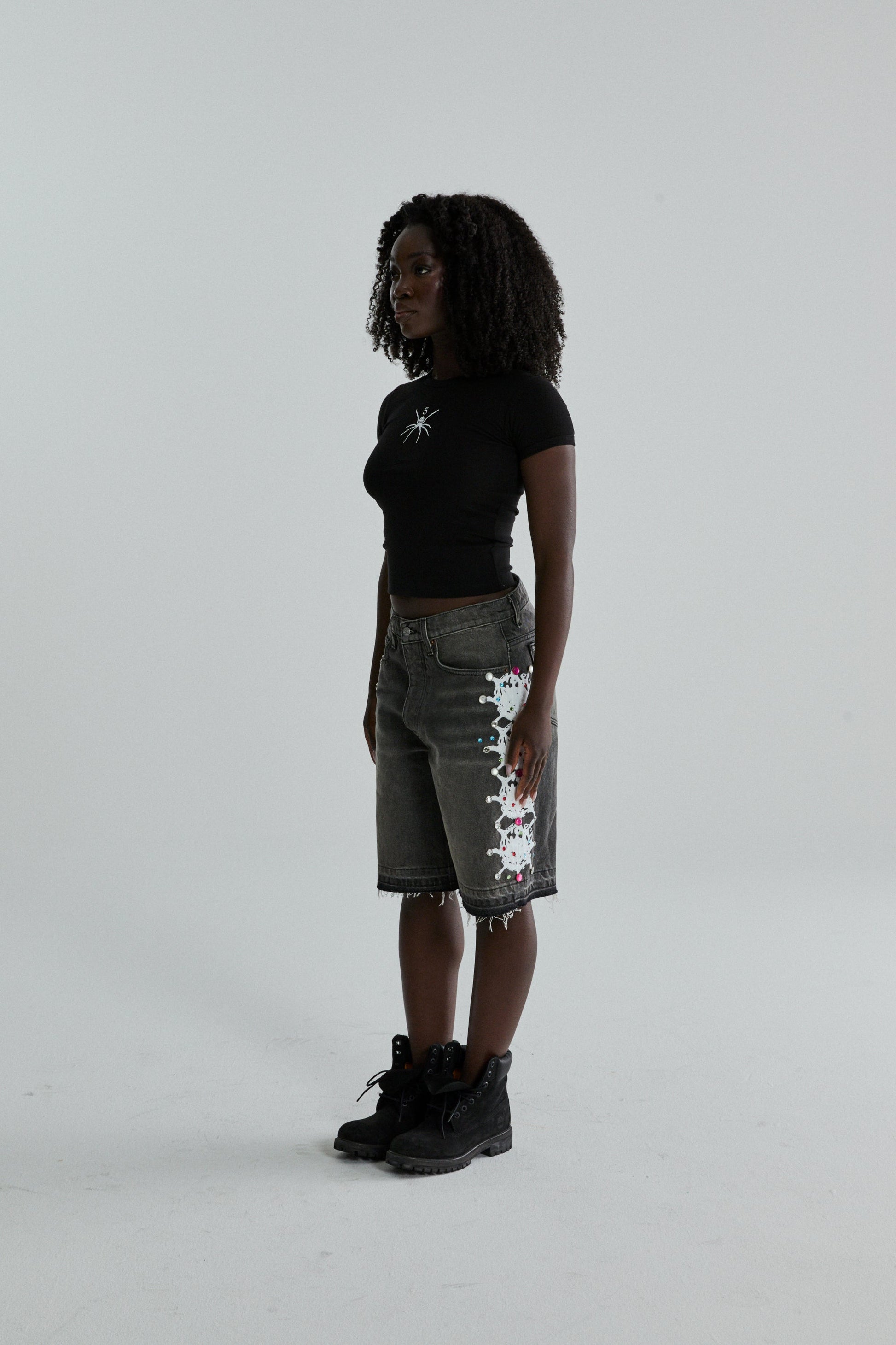 BLACK TM BABY TEE ON MODEL