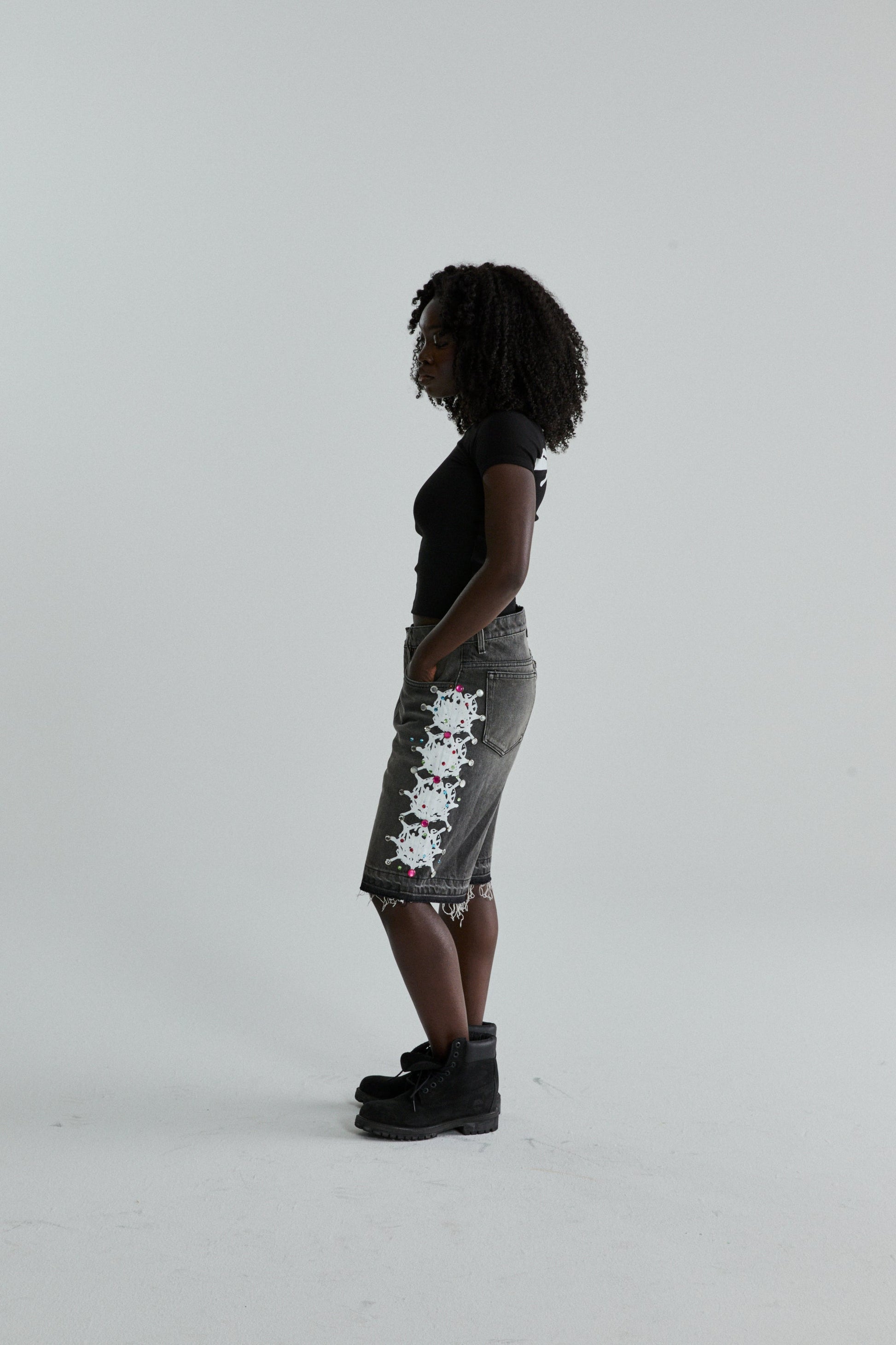 BLACK TM BABY TEE ON MODEL