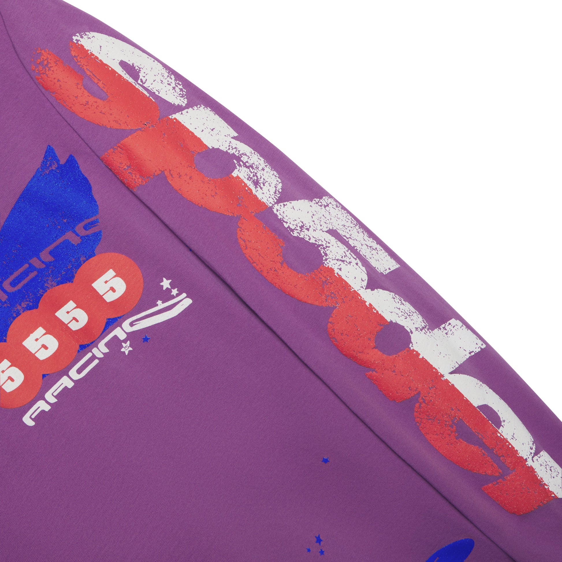 Purple cotton long sleeve tee with red, white, and blue graphic print on front and sleeves.