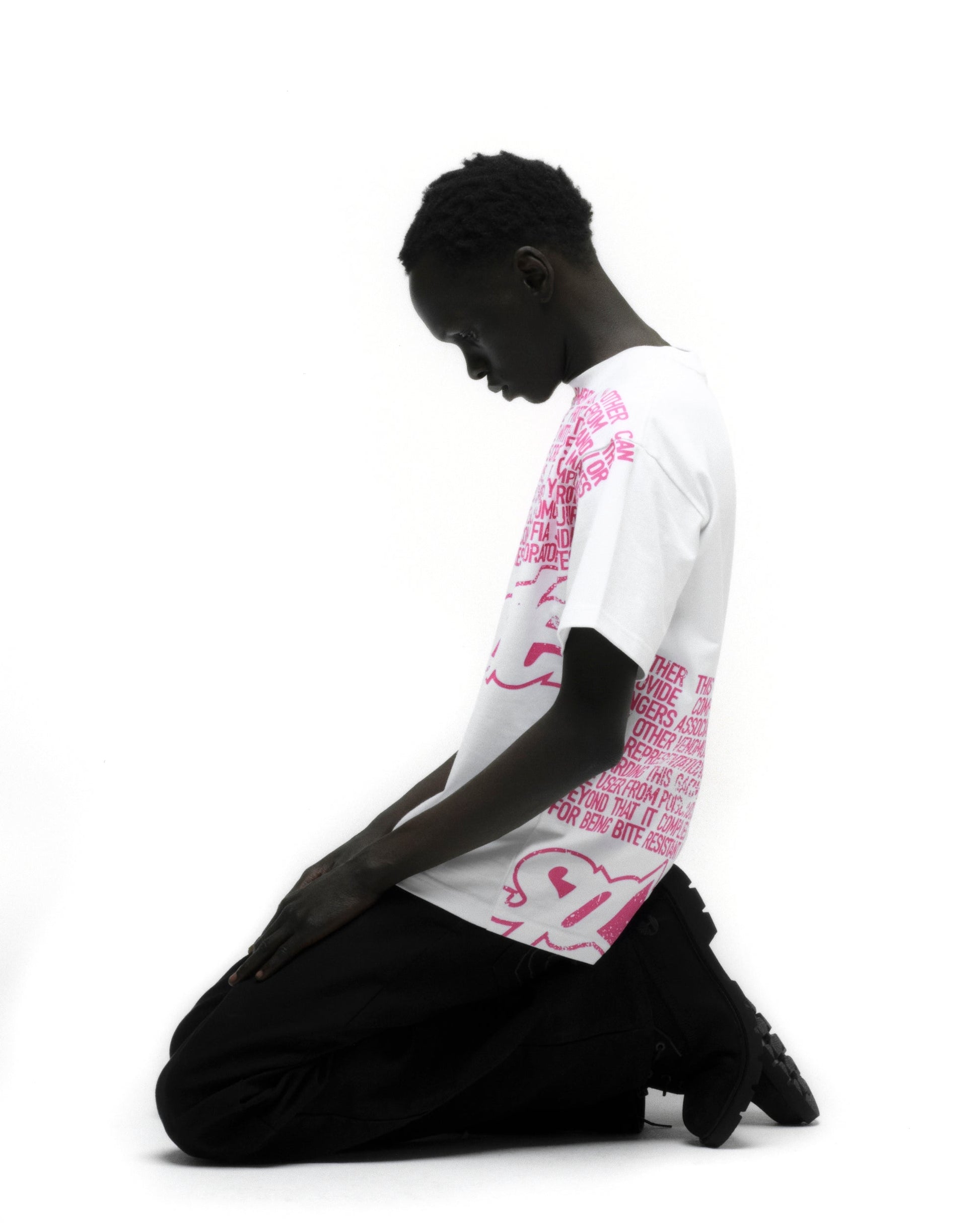 DISCLAIMER TEE ON MODEL
