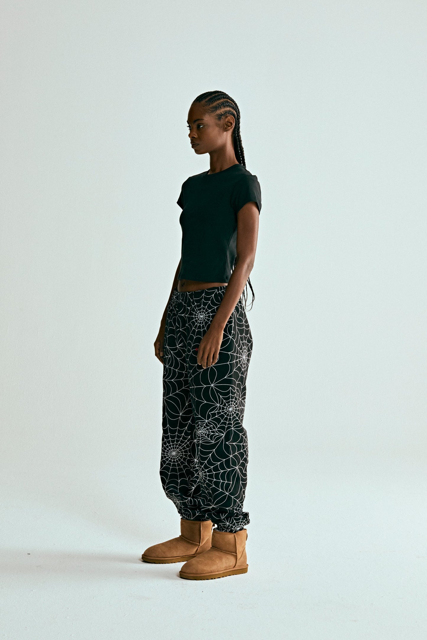 BLACK EMBROIDERED AOP SWEATPANT ON MODEL