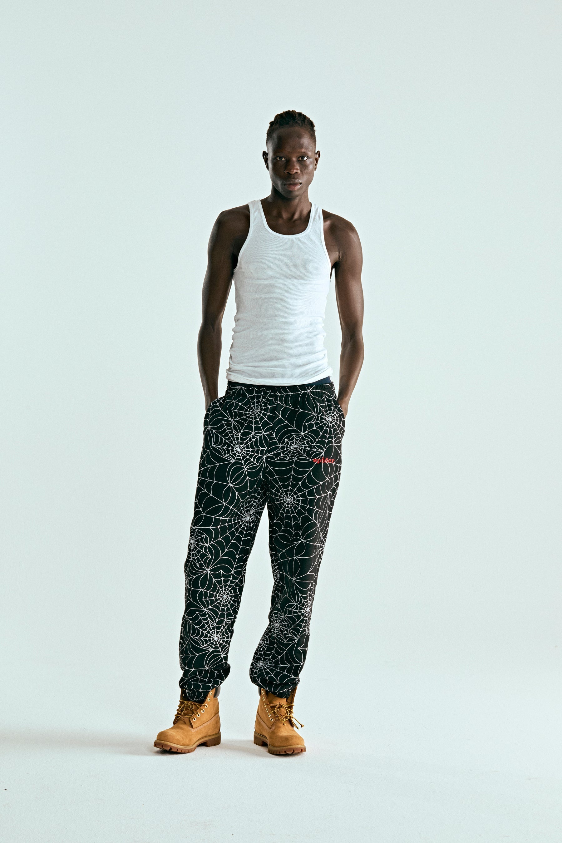 BLACK EMBROIDERED AOP SWEATPANT ON MODEL