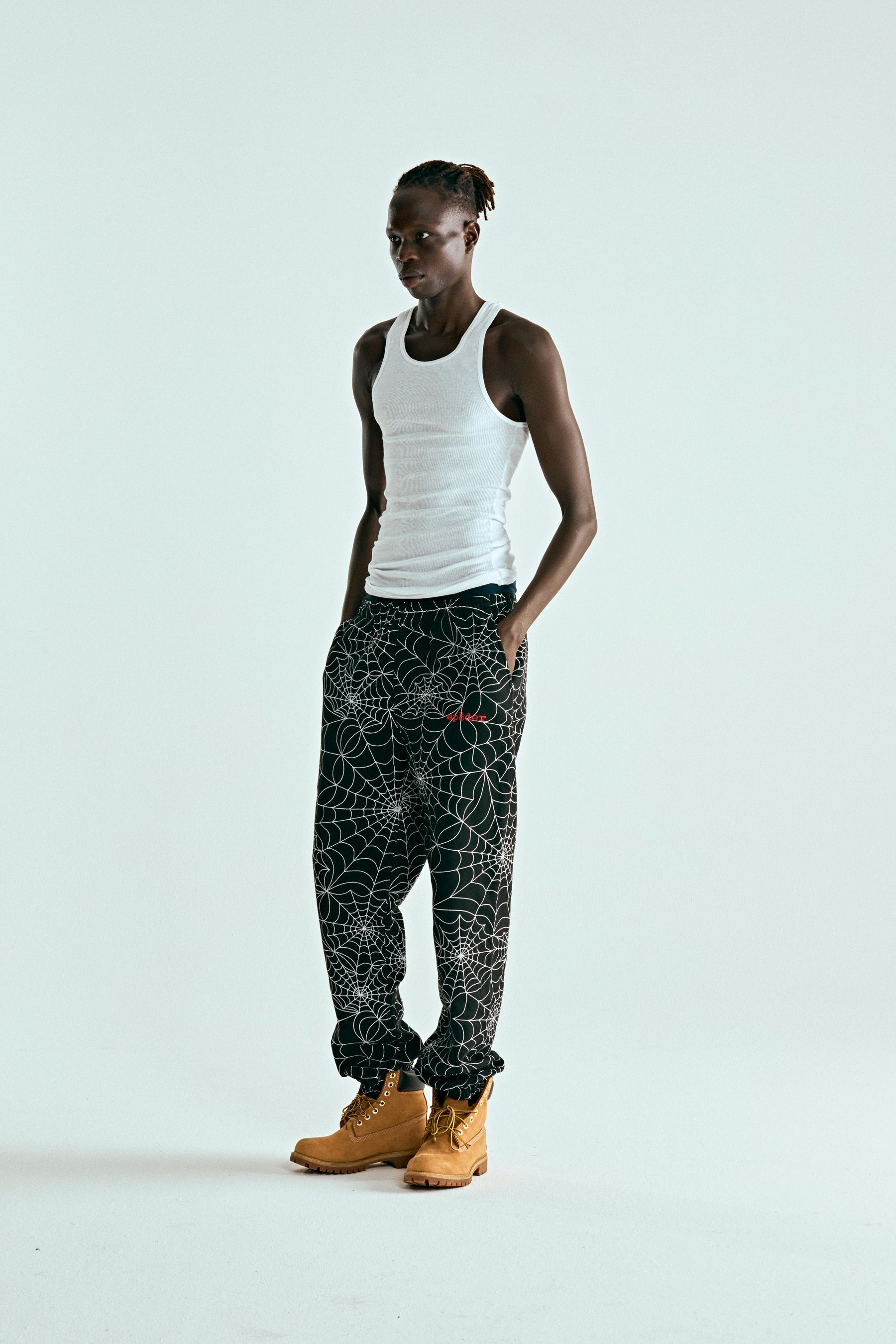 BLACK EMBROIDERED AOP SWEATPANT ON MODEL