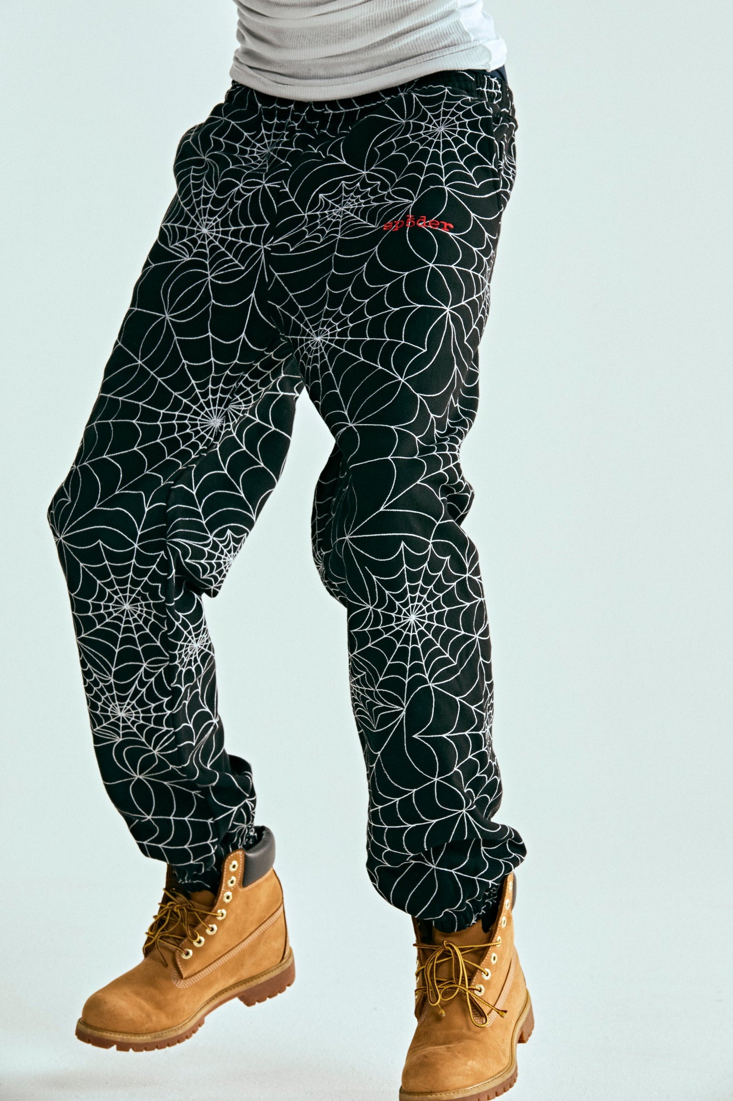 BLACK EMBROIDERED AOP SWEATPANT ON MODEL