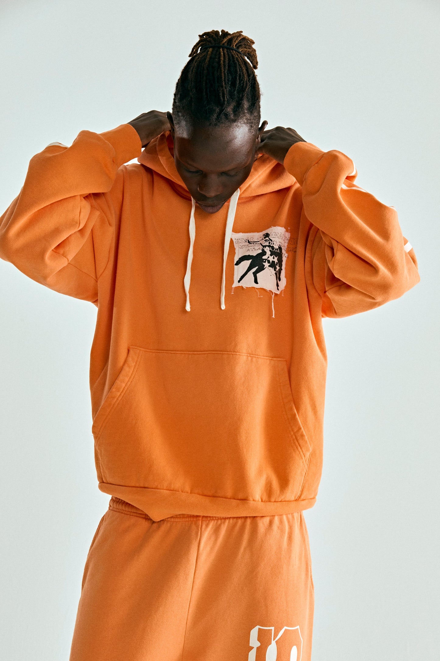 ORANGE 5STAR RODEO HOODIE ON MODEL