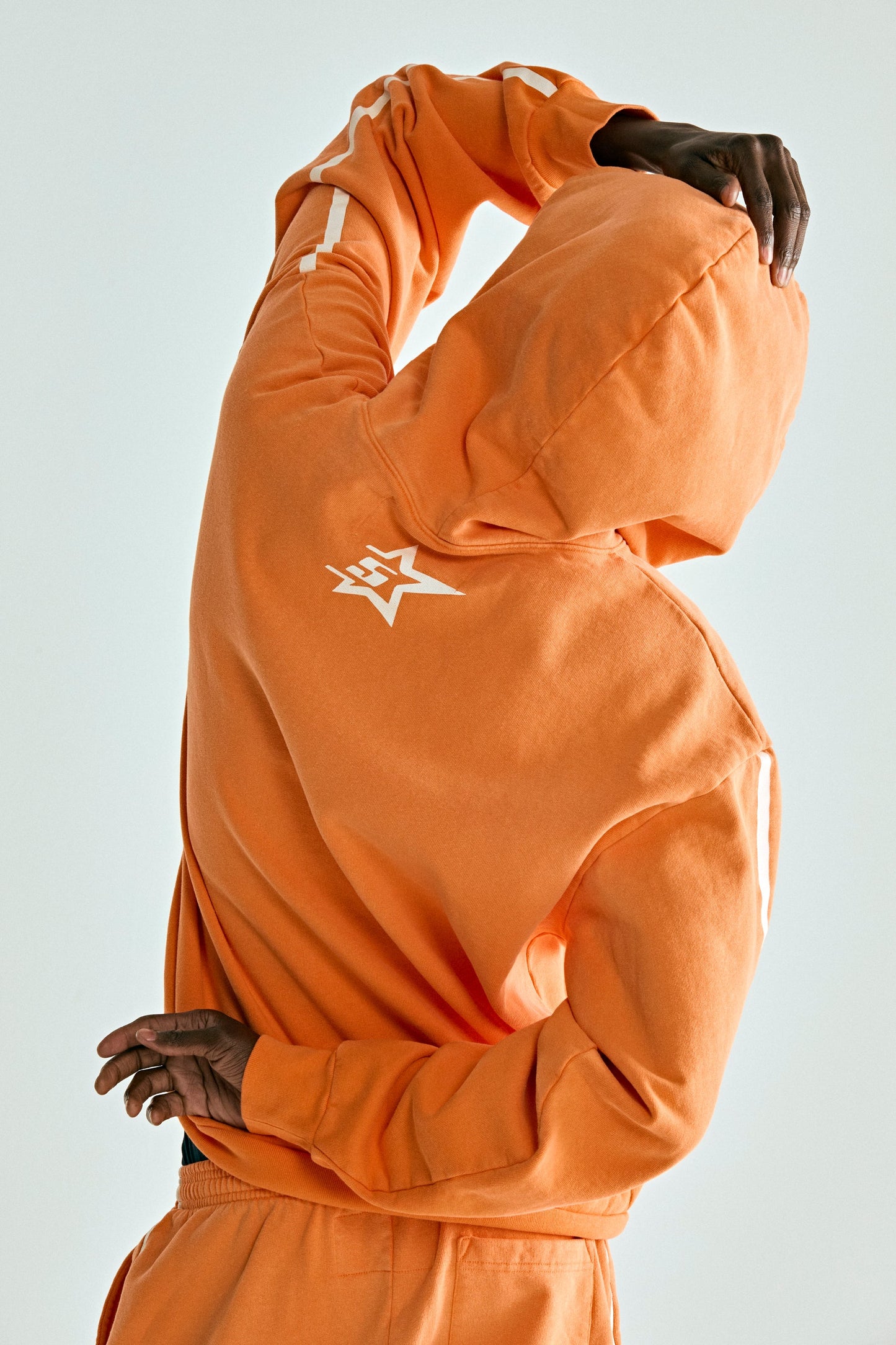 ORANGE 5STAR RODEO HOODIE ON MODEL