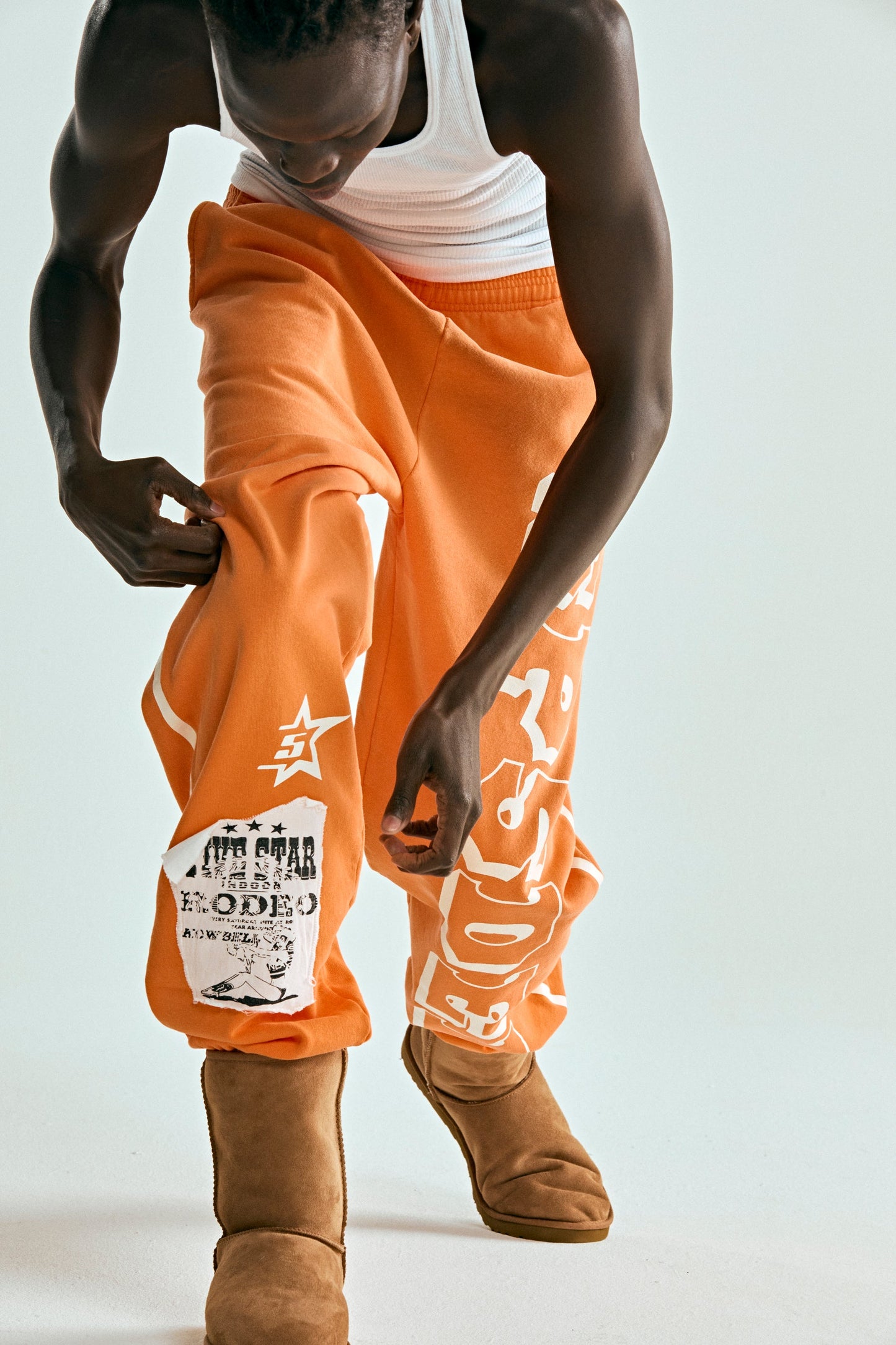 ORANGE 5STAR RODEO SWEATPANT ON MODEL