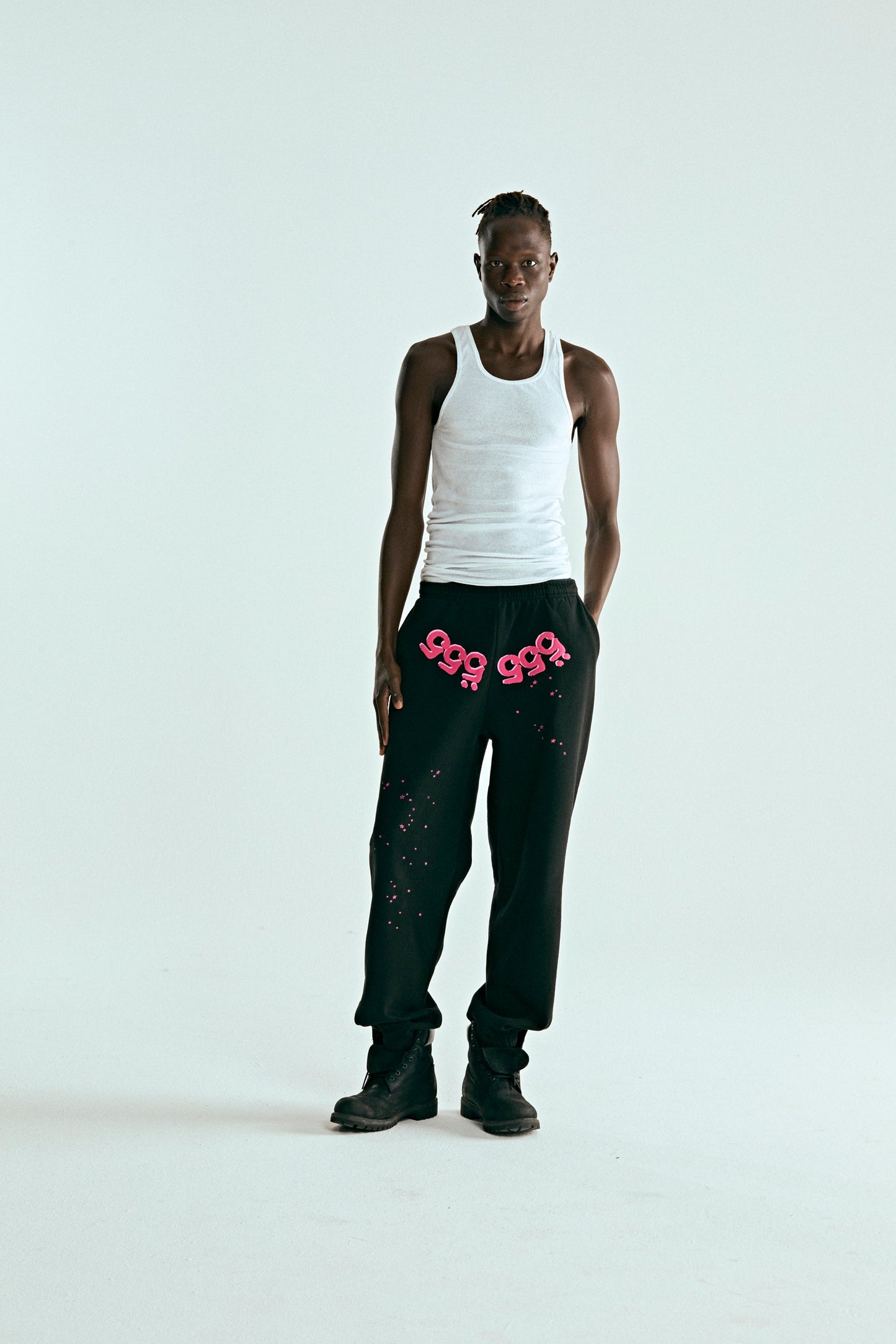 BLACK ANGEL NUMBER SWEATPANT ON MODEL