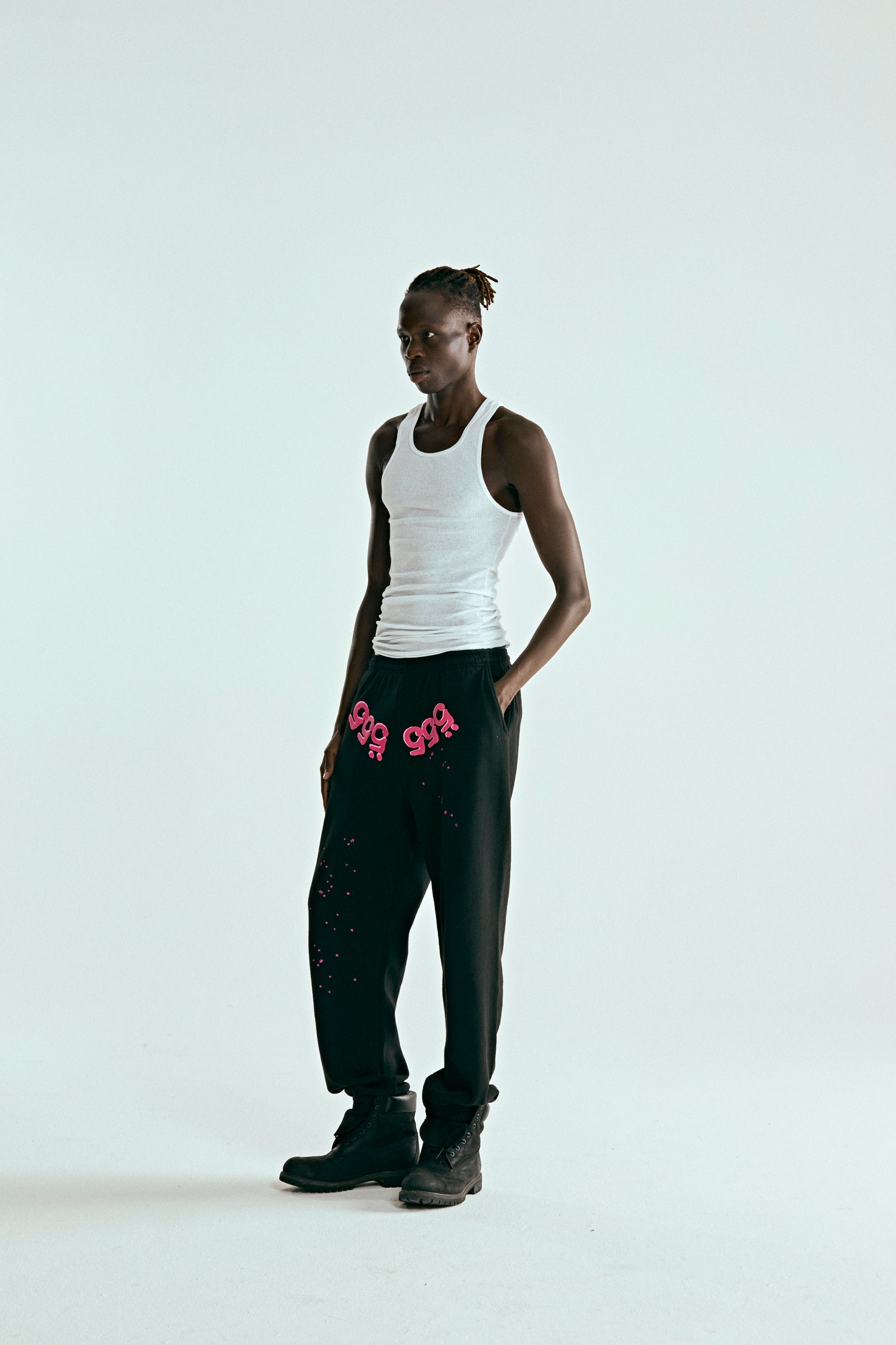 BLACK ANGEL NUMBER SWEATPANT ON MODEL