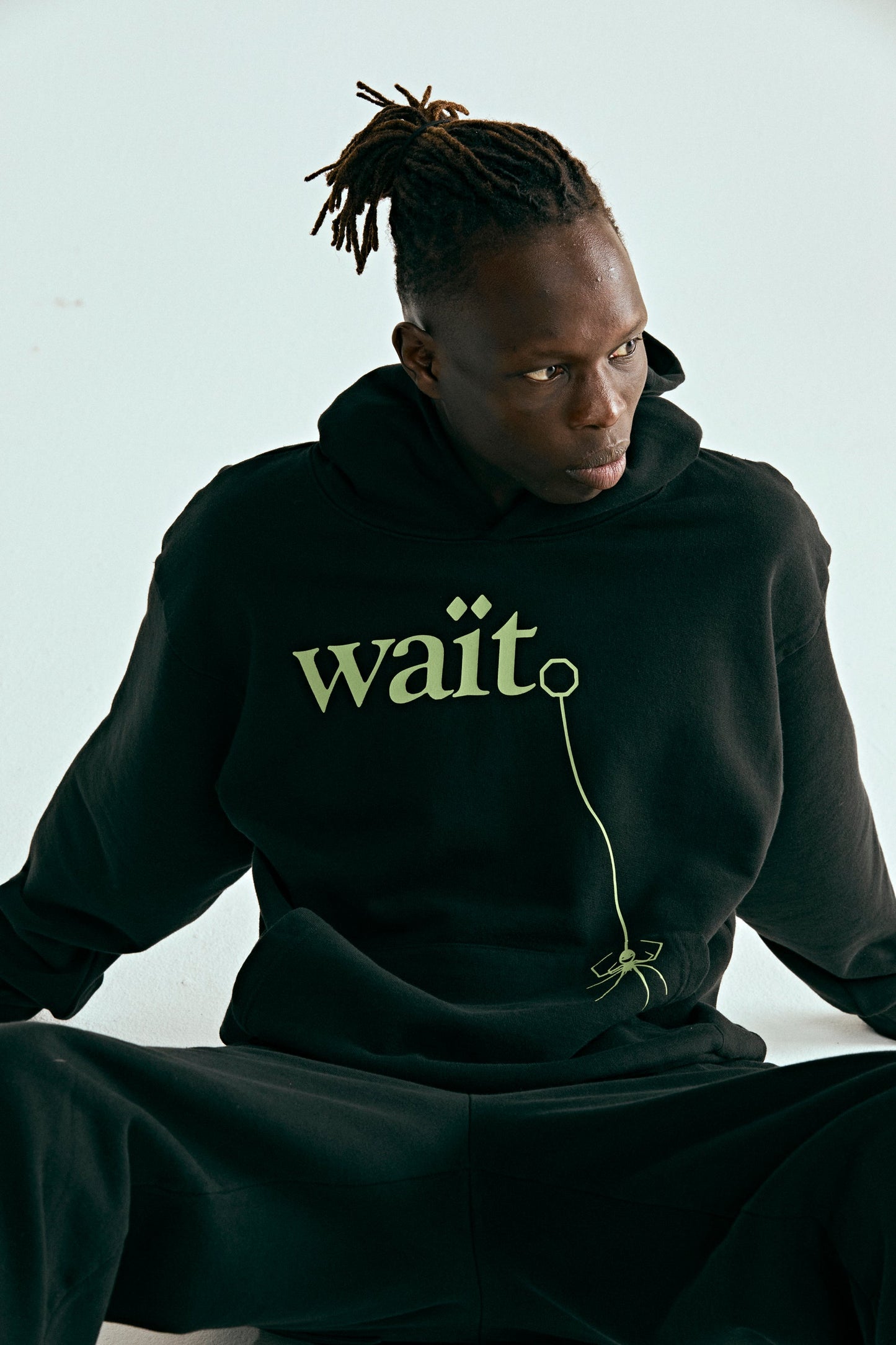 BLACK WAIT HOODIE ON MODEL