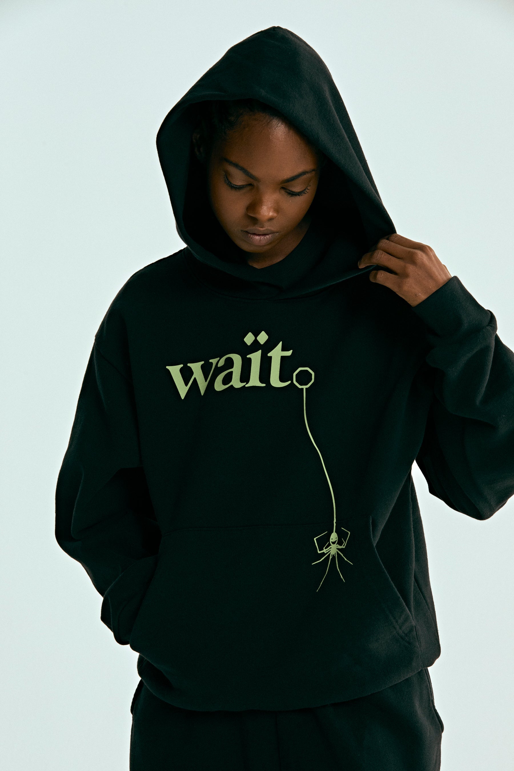 BLACK WAIT HOODIE ON MODEL