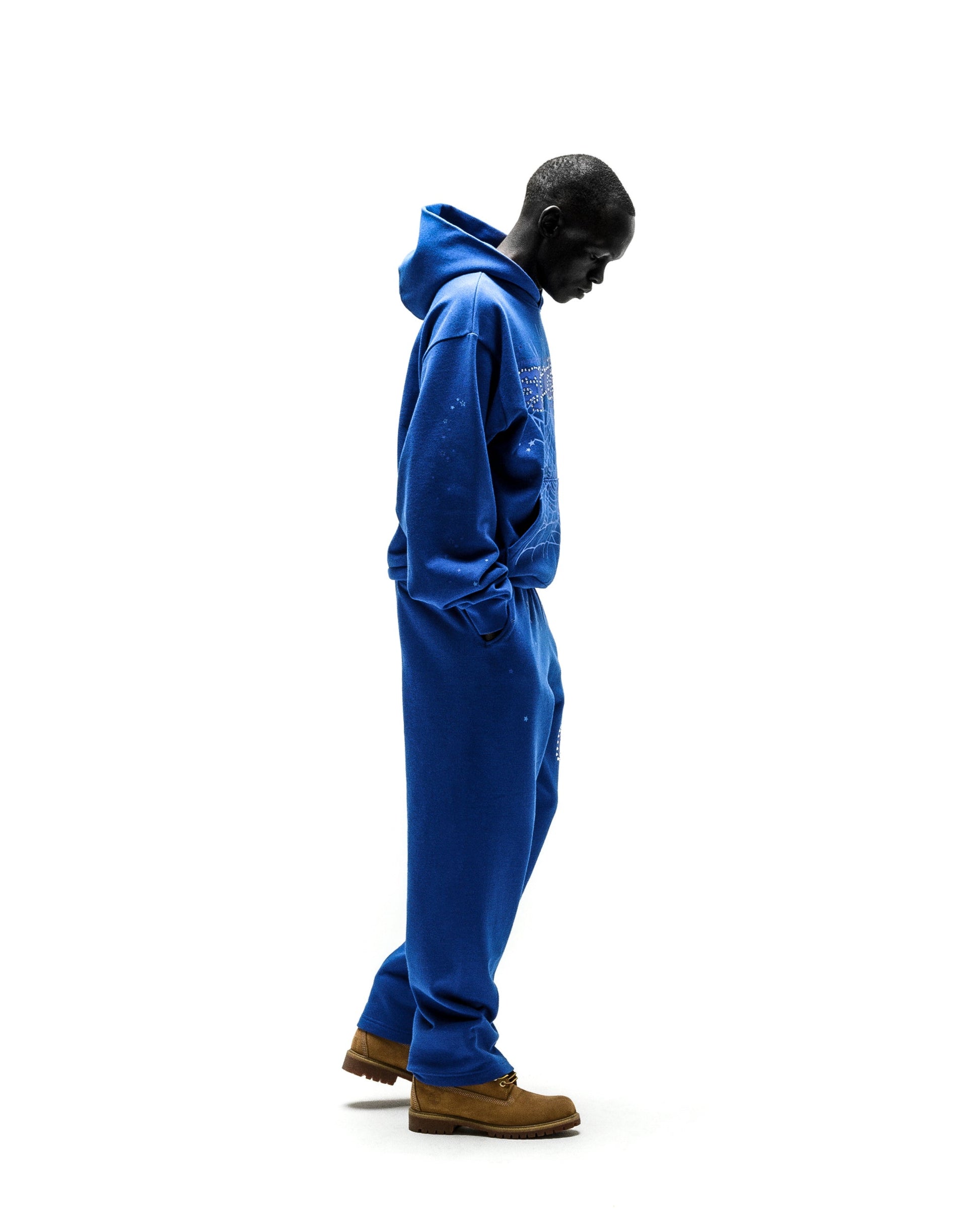 Blue RHINESTONE PUNK V2 HOODIE and sweatpants set with rhinestone SP5DER motif.